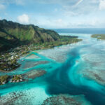 An aerial view of French Polynesia Moorea tropical island on a sunny day